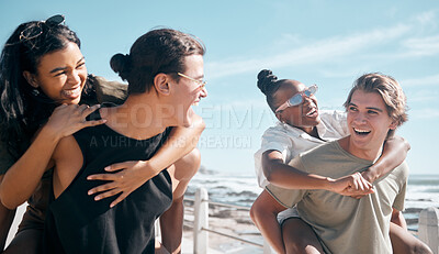 Buy stock photo Couple of friends, laughing and piggyback by beach, ocean or sea in social gathering, group vacation comedy or summer holiday. Smile, happy and diversity men carrying women in travel, bonding or game