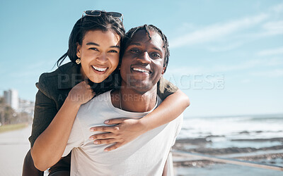 Buy stock photo Bonding couple, portrait or piggyback by beach, ocean or sea in relax mock up holiday, love vacation or summer travel. Smile, happy or man carrying black woman in fun game, freedom trust or support