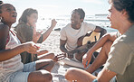 Couple of friends, dancing or guitar by beach, ocean or sea in holiday vacation, summer travel or social gathering. Dance, happy and bonding diversity people with musical instrument in relax picnic