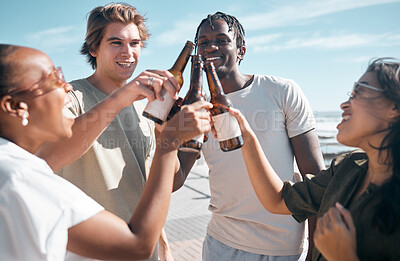 Buy stock photo Cheers, beer and friends at the beach on a vacation, adventure or weekend trip in summer. Toast, alcohol and group of people enjoying a drink together on the promenade by the ocean while on holiday.