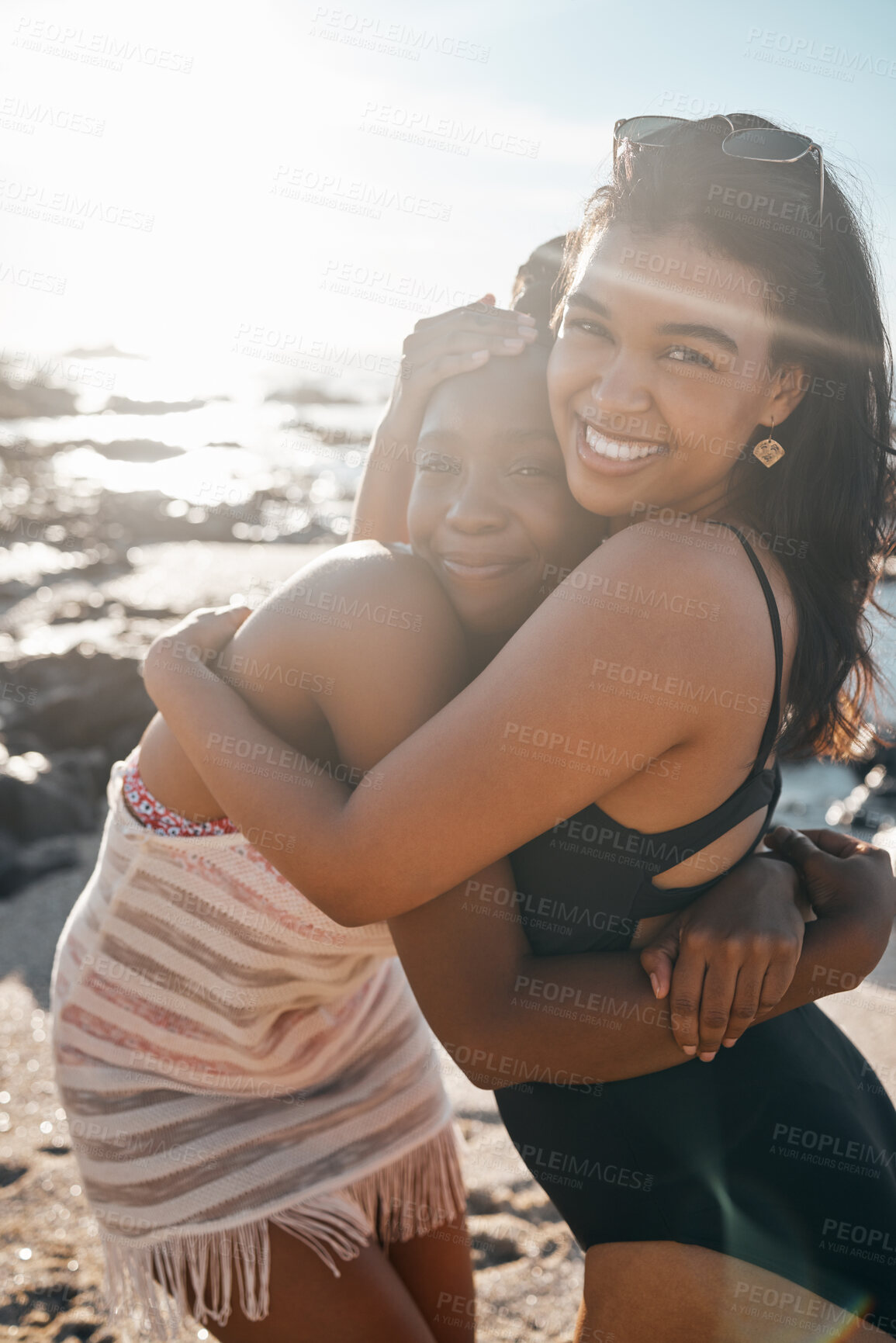 Buy stock photo Women, portrait or friends embrace by beach, sea or ocean in summer holiday bonding, support vacation or girls travel location. Smile, happy or black people in hug, social gathering or relax nature