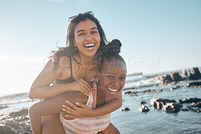 Buy stock photo Friends, laughing or piggyback portrait by beach, ocean or sea in social gathering, vacation comedy or summer holiday. Smile, happy or black woman carrying girl in travel fun, bonding or comic games