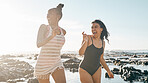 Laughing women, swimwear and running by sea, ocean or beach water on happy summer, comic holiday or bonding travel. Black people, women and friends in swimsuit for freedom, swimming or funny games