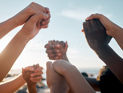 Buy stock photo Friends, bonding and holding hands on beach community trust support, social gathering or summer holiday success. Men, women and diversity people in solidarity, team building or travel mission goals