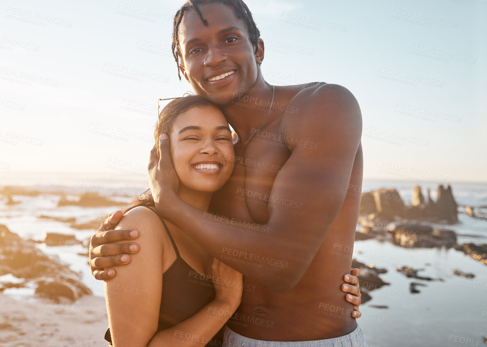 Buy stock photo Couple portrait, swimsuit or sunset beach hug in relax romance holiday, love vacation date or bonding summer location. Smile, black woman or man in swimwear embrace, freedom trust or travel support