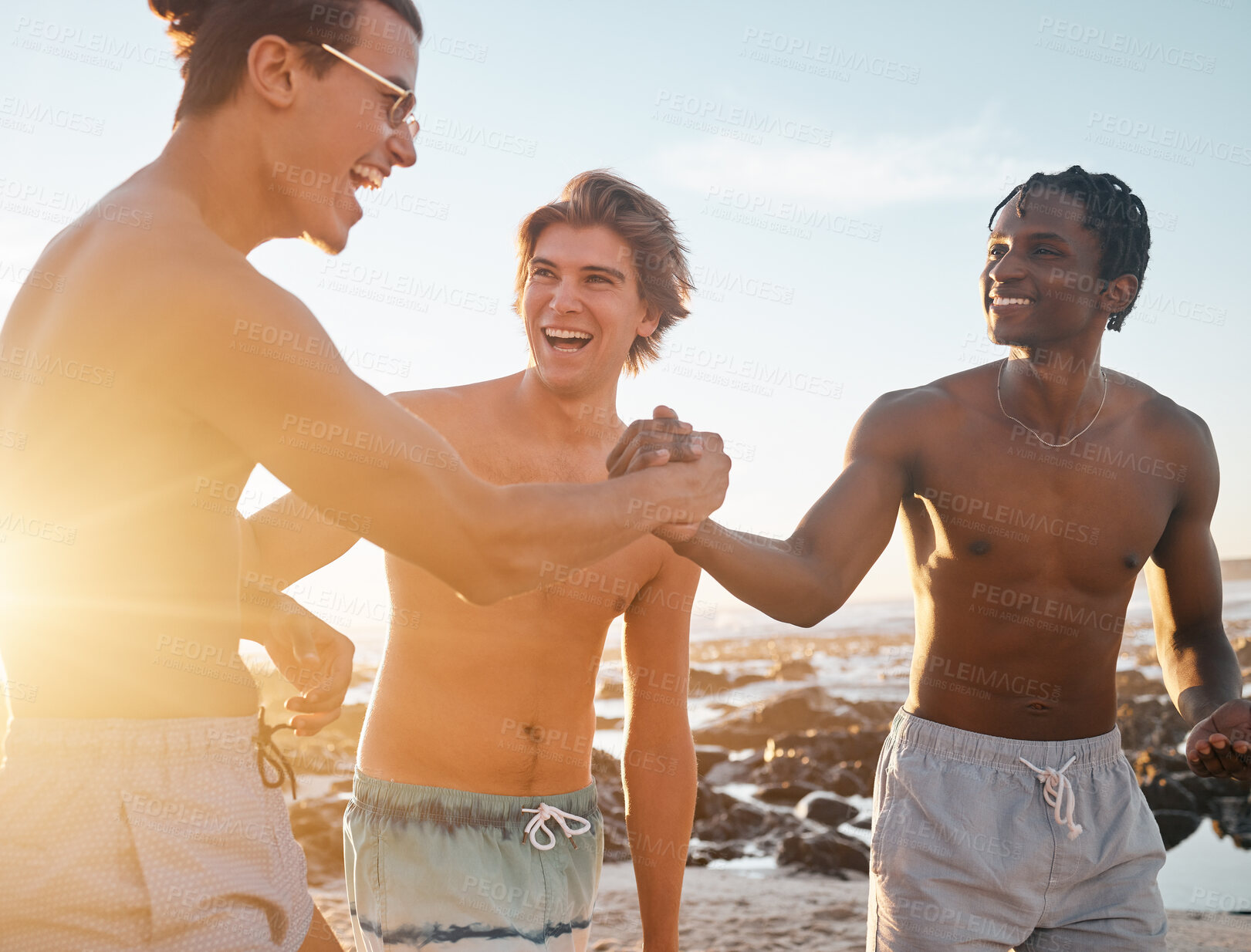 Buy stock photo Men, friends or handshake on sunset beach in energy game, community or excited freedom. Smile, happy or bonding shaking hands in travel vacation, social gathering laugh or diversity holiday fun