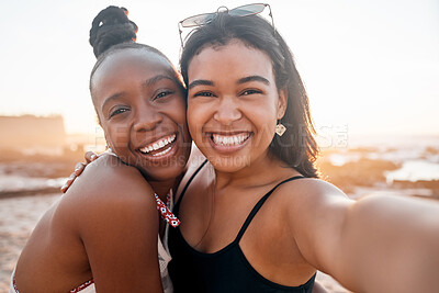 Women, portrait and selfie of friends at beach outdoors bonding, laughing and enjoying holiday sunset. Travel face, freedom and girls taking pictures for social media, profile picture or happy memory