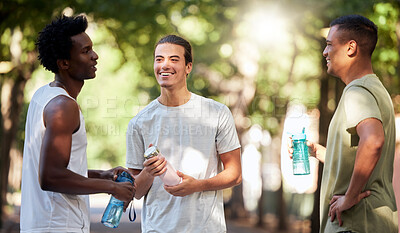 Buy stock photo Fitness, friends and men in park with water, relax and talking on break from running or outdoor exercise together. Nature, workout and health, group of people rest and drink during sports training.