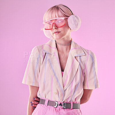 Buy stock photo Fashion, glasses and woman on pink background for beauty, vaporwave style and cosmetics in studio. Creative aesthetic, makeup and female model with earmuffs, trendy clothes and cyberpunk accessories