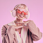 Fashion, tongue and funny face of a woman quirky in studio for comic glasses on pink background. Aesthetic model person with thinking funny thought for edgy vaporwave trend with creativity and color