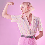 Woman, flexing arm muscle and smile, power and strong female and winner isolated on pink background. Freedom fight, empowerment and strength with confidence, pride in challenge with champion and win