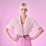 Fashion, trendy and portrait of a woman in a studio with a edgy, cool and stylish outfit. Style, pastel and young fashionable female model from Canada posing while isolated by a pink background.