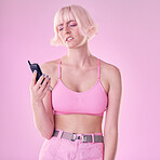 Problem, fashion and woman with vintage phone on pink background with network issue, glitch or spam. Creative aesthetic, beauty and confused girl with retro cellphone, makeup and cosmetics in studio