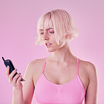 Retro phone, fashion and woman with problem on pink background with network issue, glitch or spam. Creative aesthetic, beauty and confused girl with vintage cellphone, makeup and cosmetics in studio