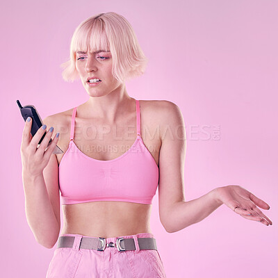 Buy stock photo Retro phone, fashion and woman with glitch on pink background with network issue, problem or spam. Creative aesthetic, beauty and confused girl with vintage cellphone, makeup and cosmetics in studio