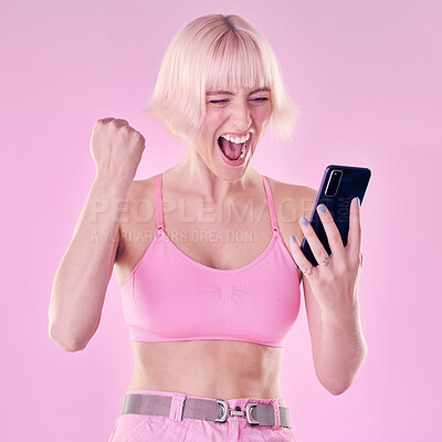 Buy stock photo Winner, fashion and woman with phone on pink background for success, winning and online competition. Smartphone, beauty and excited, happy and girl cheering for bonus, discount deal and promotion