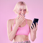 Laugh, fashion and woman with phone on pink background for social media meme, internet joke and website. Networking, beauty and excited, smile and happy girl with smartphone for online conversation