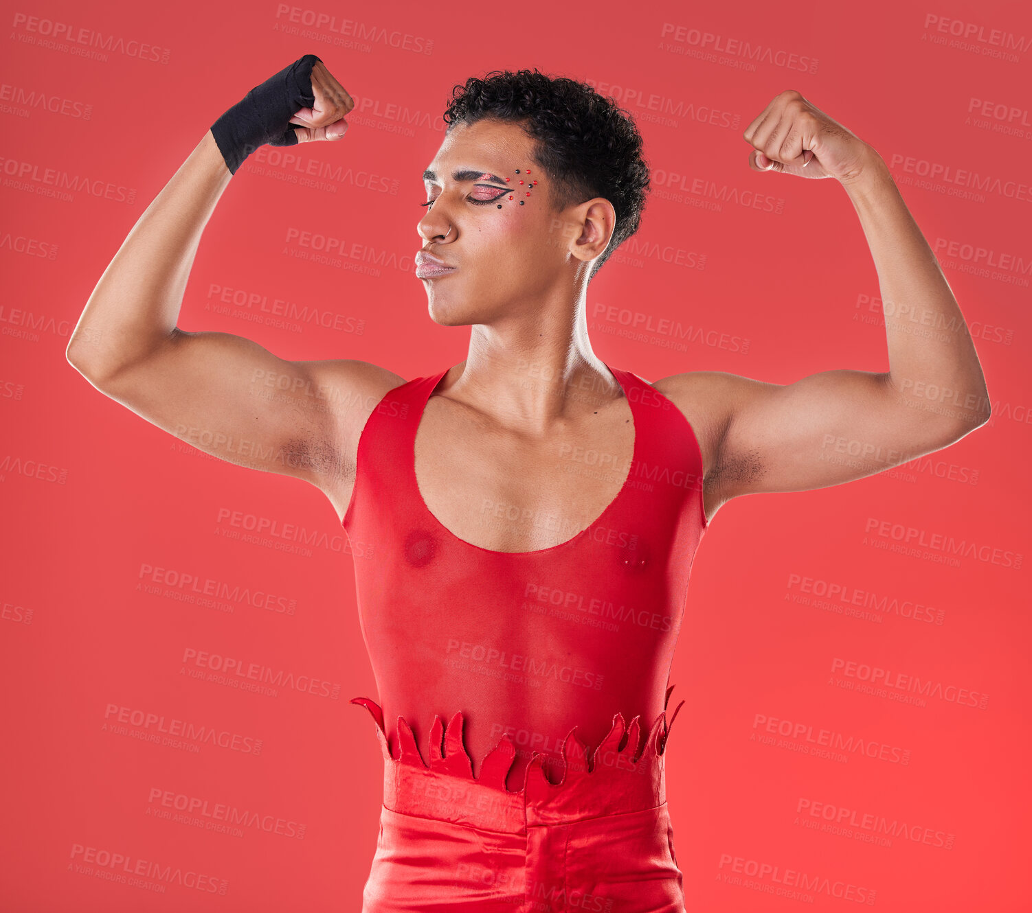 Buy stock photo LGBTQ, flexing and empowerment of gay man or nonbinary person with fashion isolated in studio red background. Strength, queer and model with style and beauty in the gen z and LGBT community pride