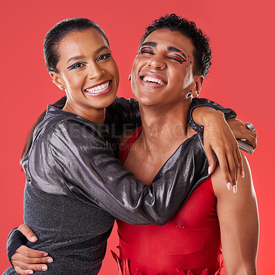 Buy stock photo Portrait, fashion and friends hug, smile and creative with trendy, stylish and edgy outfits with studio background. Face, black woman and happy man embrace, happiness and joyful with artistic clothes
