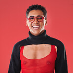 LGBTQ, queer and portrait of a gay man with unique fashion and style isolated against a studio red background. Transgender, homosexual and nonbinary person happy, smile and excited for skincare