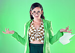 Confused, anger and portrait of a teacher with paper isolated on a green background in a studio. Anxiety, tired and trendy woman with edgy and fashionable style throwing paperwork while frustrated