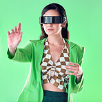 Woman, vr and glasses in studio with hand by green screen, background and teaching online. Young model, education and ideas with virtual reality learning, mockup and with fashion, focus and metaverse