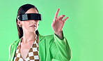 Woman, virtual reality and glasses in studio with hand by green screen, background and teaching online. Young model, education and ideas with vr learning, mockup and with fashion, pride and metaverse