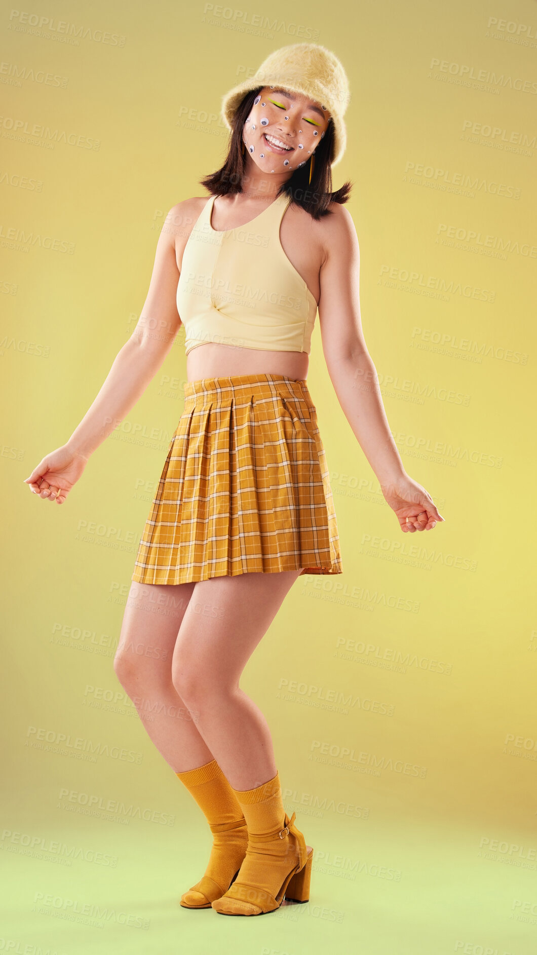 Buy stock photo Dancing, Asian woman and retro fashion isolated on a yellow background in a studio. Happy and stylish girl model with dance for freedom, motivation and carefree mindset with creative or crazy energy