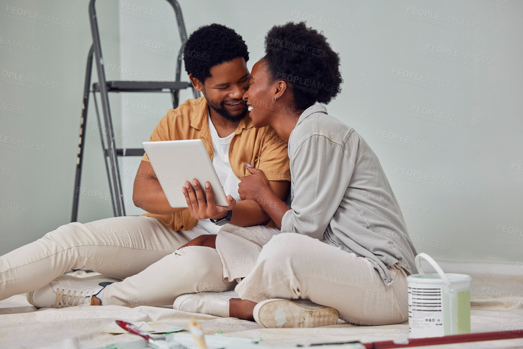 Buy stock photo Painting, tablet or black couple online shopping for home renovation, diy or house remodel together. Digital, ecommerce choices or African man on the internet with woman excited about family property