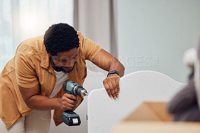 Buy stock photo DIY, drill and crib with a black man in his house to build furniture in the baby bedroom or nursery. Family home, handyman and cot with a father in a room building a bed for his newborn kid