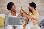 Laptop, pregnant woman and black man high five on sofa, excited and planning baby arrival with app online. Pregnancy, love and support, happy couple celebrate on couch with internet in living room.