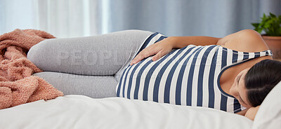 Buy stock photo Pregnant, rest and woman on bed, health and wellness to relax, break and touching stomach. Pregnancy, female and lady in bedroom, maternity leave and peace in home, growth and support for development