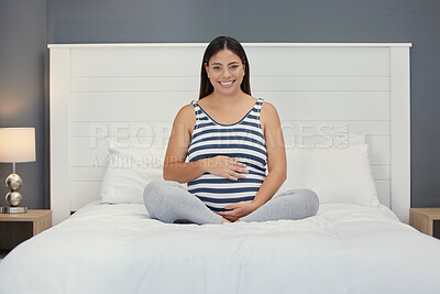 Buy stock photo Excited, motherhood and portrait of a pregnant woman on a bed for peace, rest and touching stomach. Smile, baby and girl feeling her belly during a pregnancy, maternity leave and relax in the bedroom