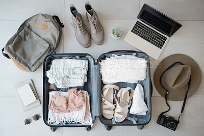 Buy stock photo Travel, suitcase and laptop with camera for vacation or holiday with online booking on floor. Above luggage, clothes and shoes while planning for summer photography journey motivation or inspiration