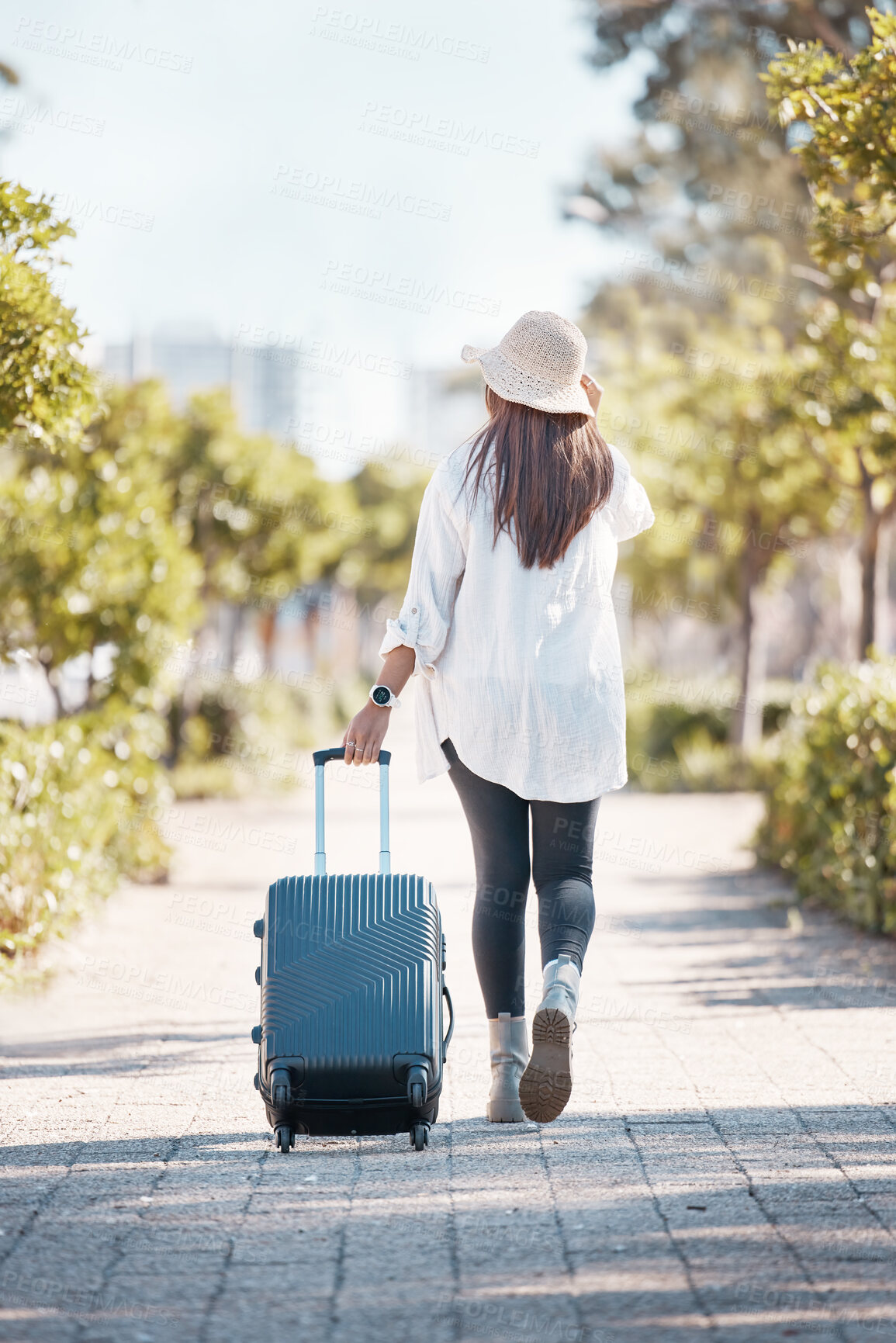 Buy stock photo Travel, city and woman with suitcase walking to destination for weekend, holiday and vacation. Traveling, journey and back of female in urban street with luggage to explore, adventure and commute