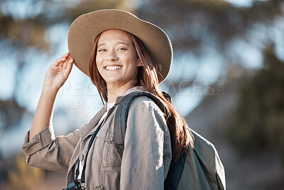 Buy stock photo Hiking woman, portrait and smile for travel, summer and explore forest with backpack, excited and happy. Explorer girl, woods and adventure with freedom, nature vacation and holiday for training goal