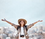 Woman, mountain and hands open with cityscape, mockup and training for holiday, summer and wellness with sky. Girl, travel and mock up with city skyline, buildings and happiness in morning sunshine