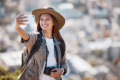 Buy stock photo Woman, tourist and smile for travel selfie on hiking adventure, backpacking journey or profile picture in nature. Female hiker smiling for photography, memory photo or scenery in mountain trekking