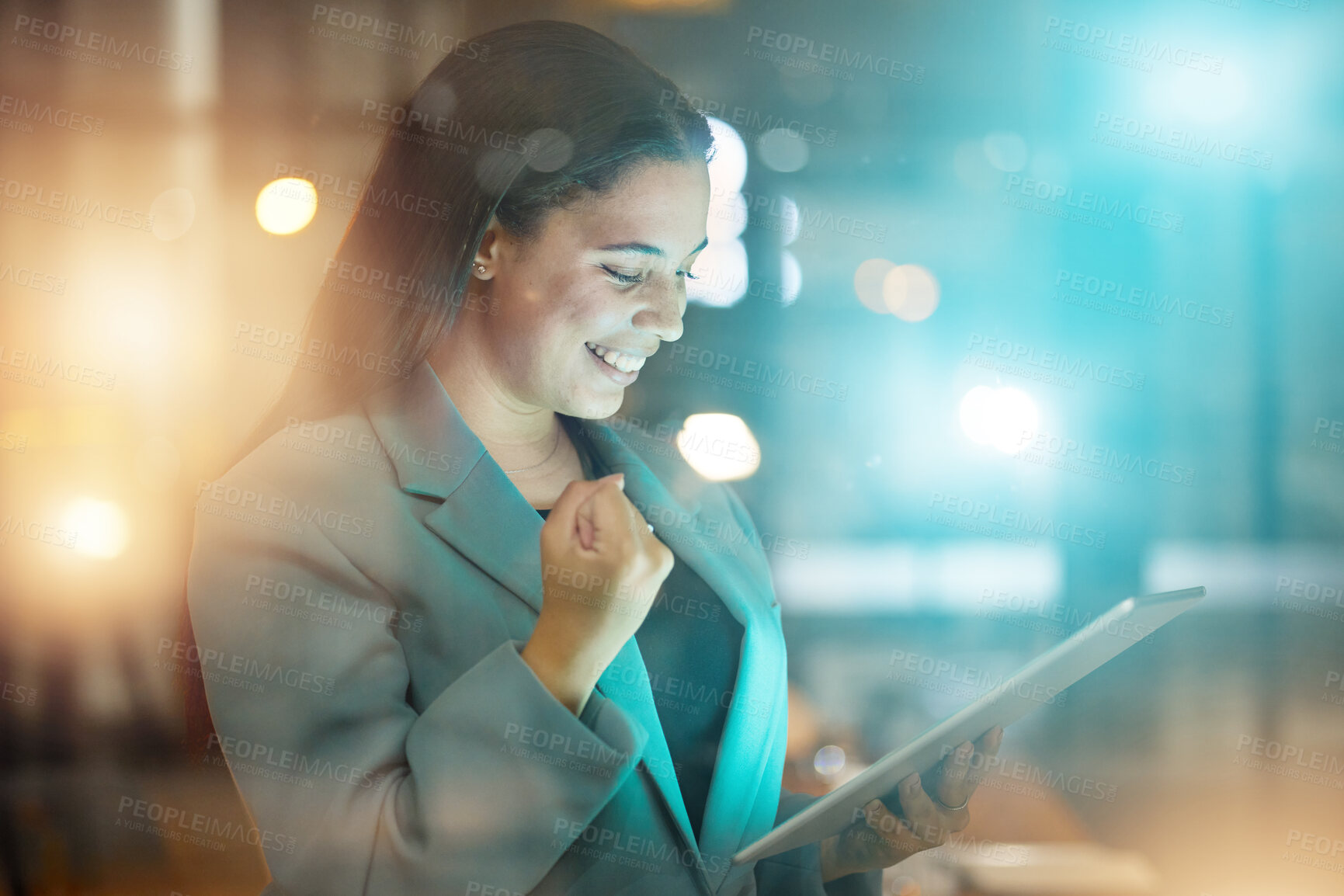 Buy stock photo Night, fist and woman with tablet, business and profit growth with success, website launch and investments. Lights, female leader and happy manager with device, gesture for celebration or achievement