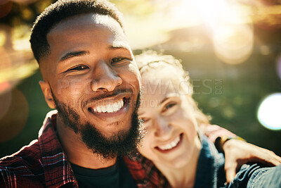 Buy stock photo Couple, love selfie and portrait smile at park outdoors, enjoying fun time and bonding together. Diversity, romance and face of black man and woman taking pictures for happy memory or social media.