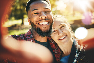 Buy stock photo Love selfie, couple and portrait smile at park outdoors, enjoying fun time and bonding together. Interracial, romance and face of black man and woman taking pictures for happy memory or social media.