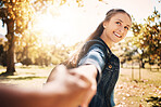 Walking, support and couple holding hands in nature for adventure, hiking and travel in Portugal. Freedom, love and man and woman in a park for bonding, vacation and traveling together on a trip