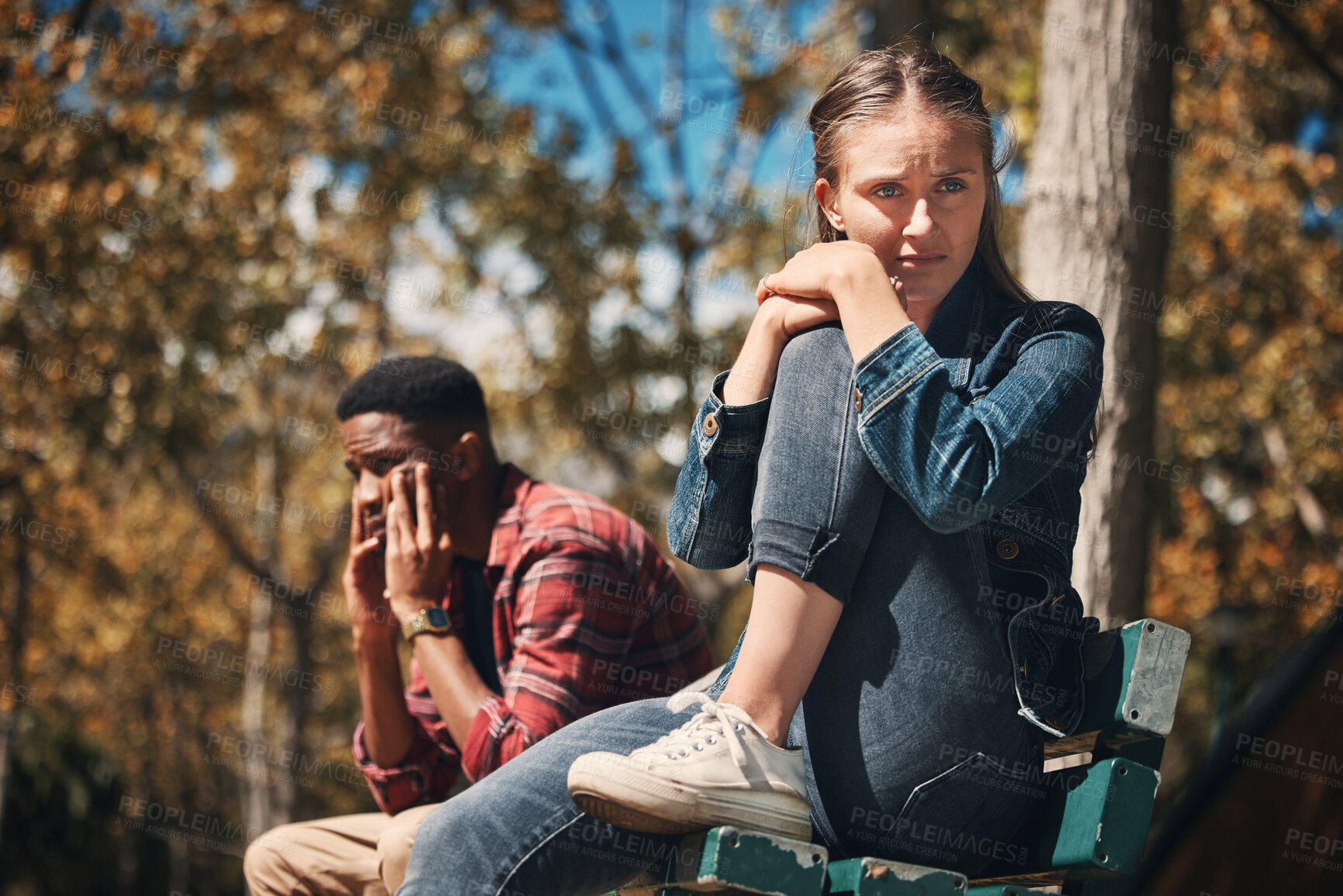 Buy stock photo Hiking, conflict and couple argue in a forest, annoyed and sad while sitting, lost and unhappy. Sad, woman and man arguing while hiking in nature, upset and angry, disappointment and breakup, trouble