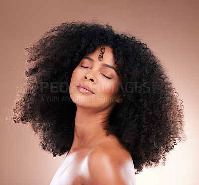 Buy stock photo Natural hair, black woman with face and haircare, beauty with skincare and cosmetics on studio background. Female, cosmetic treatment and content with curly hairstyle, texture and afro with skin glow