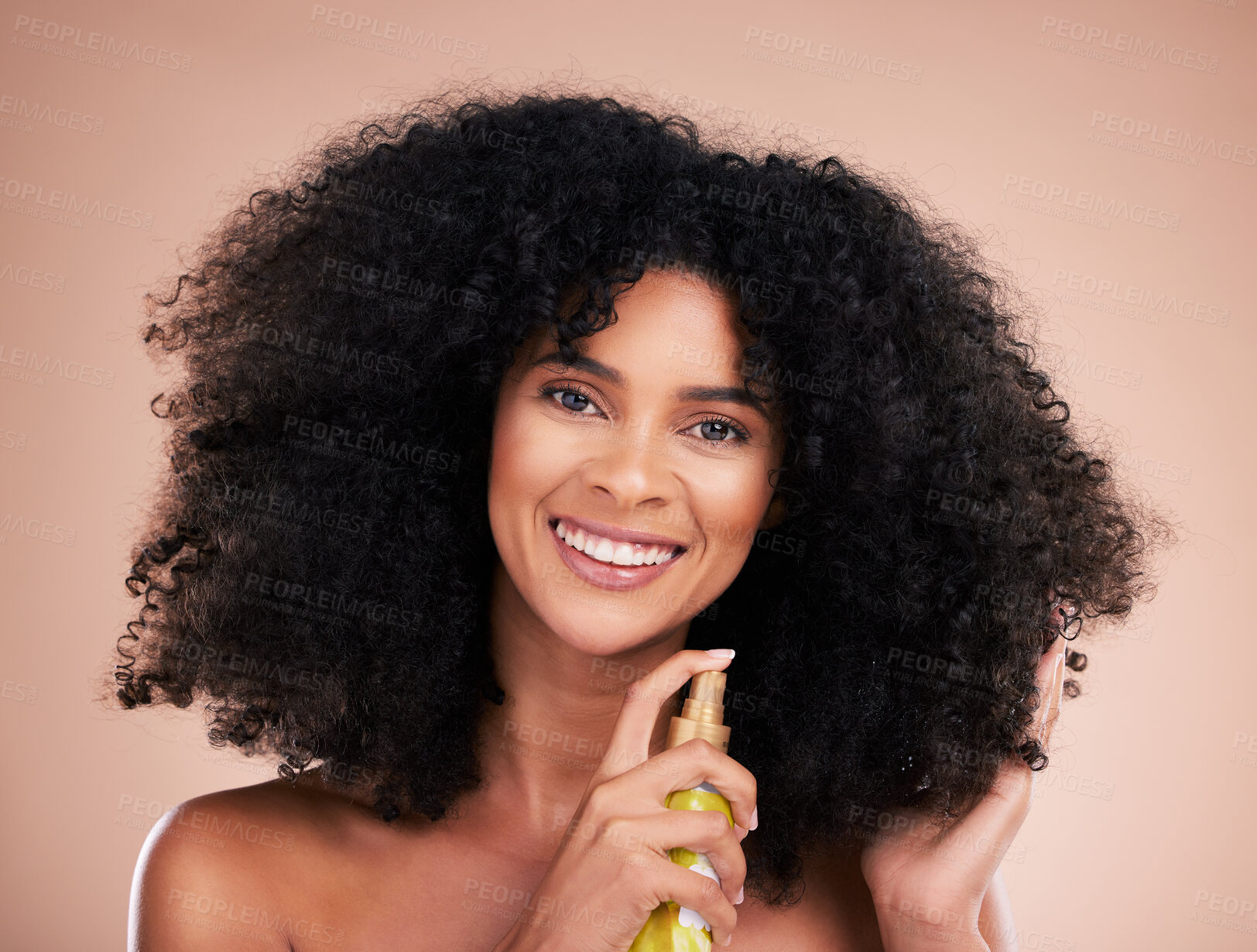 Buy stock photo Black woman, portrait or afro hair product on isolated studio background in frizz control, curly management or oil treatment. Happy beauty model, natural or haircare spray in texture health grooming