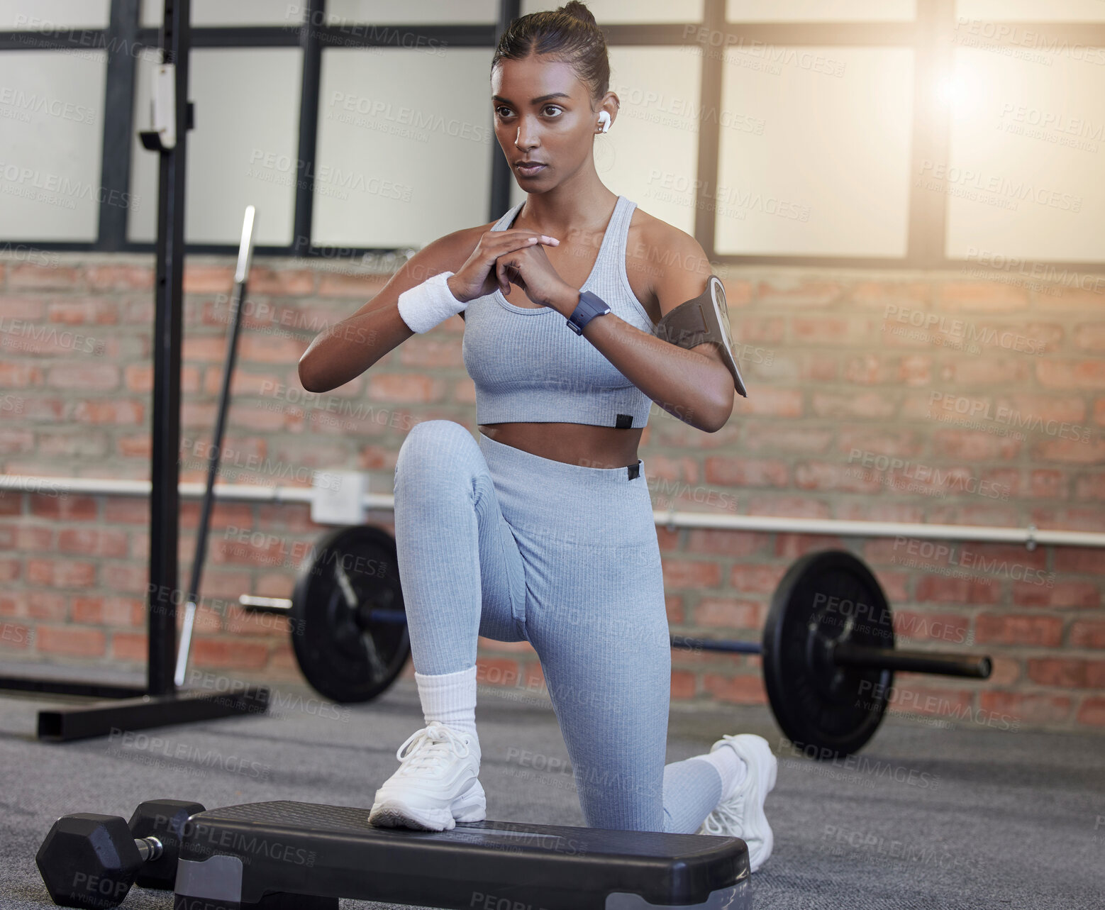 Buy stock photo Fitness, lunges or woman at gym training, exercise or body workout for powerful legs or strong muscles. Focus, resilience or healthy Indian girl athlete exercising with balance in a wellness club