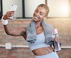 Woman, fitness and smile for selfie or profile picture in exercise, workout or training at the gym. Happy female smiling with water bottle for photo, memory or social media post in healthy wellness