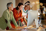 Training, planning and women on a computer for strategy on a project deadline at night. Meeting, advice and business employees reading information on a corporate plan during overtime in a dark office