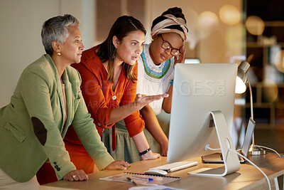 Buy stock photo Training, planning and women on a computer for strategy on a project deadline at night. Meeting, advice and business employees reading information on a corporate plan during overtime in a dark office