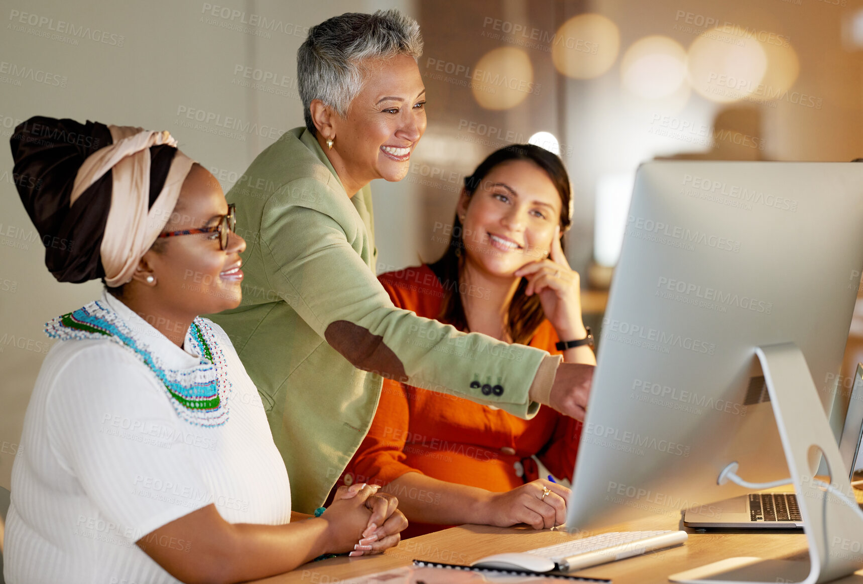 Buy stock photo Computer, team and manager working with women for research for a corporate project in office. Management, discussion and senior business woman training females on company report in workplace at night